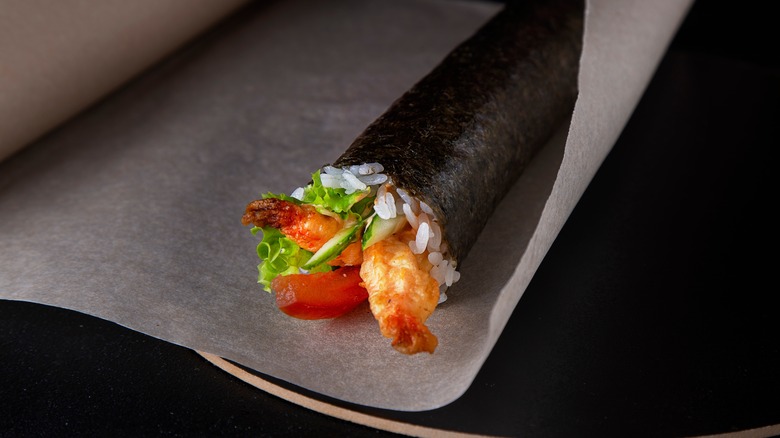 Sushi roll on parchment paper