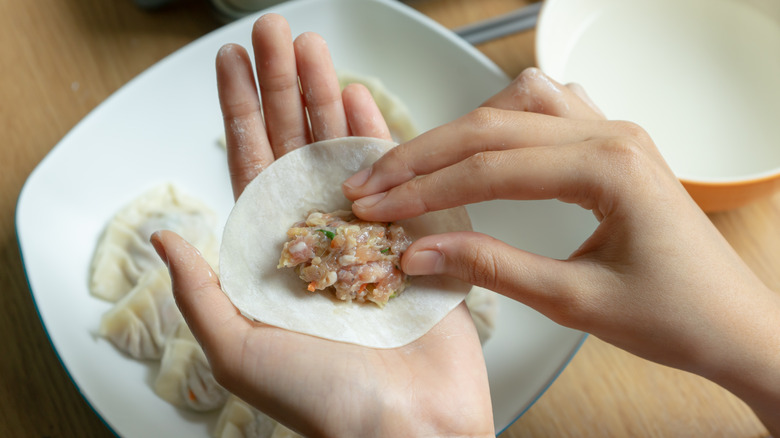Filling gyoza by hand