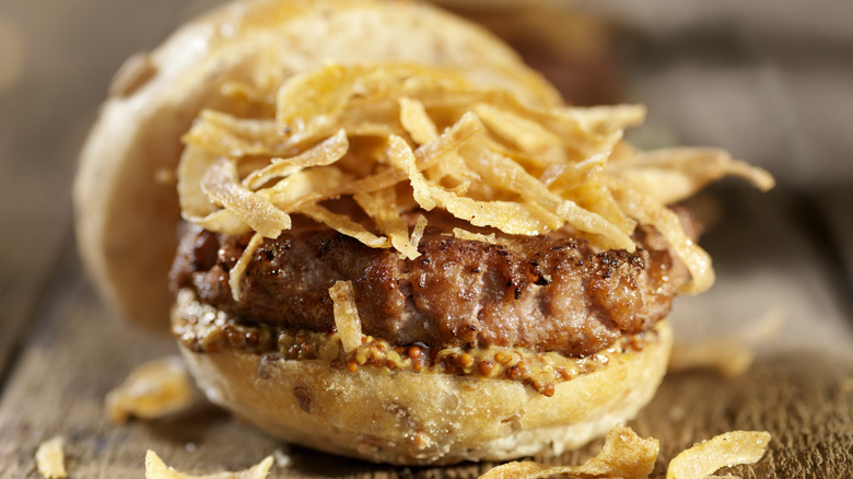 Crispy fried onions on a burger