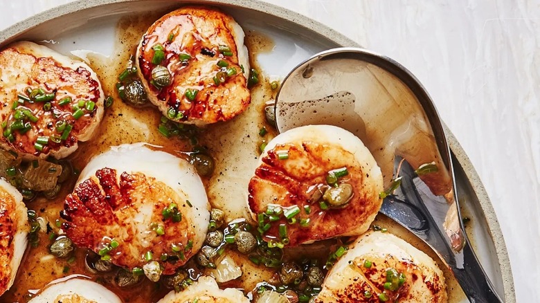 seared scallops on plate