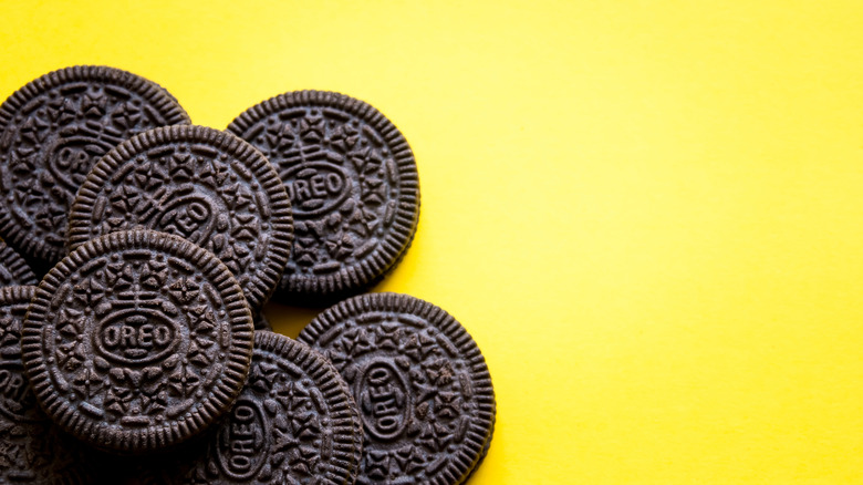 Oreo cookies on yellow background