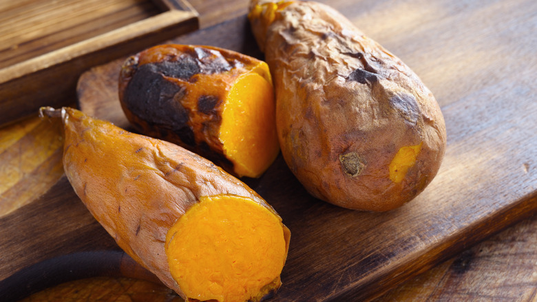 Roasted sweet potatoes on board