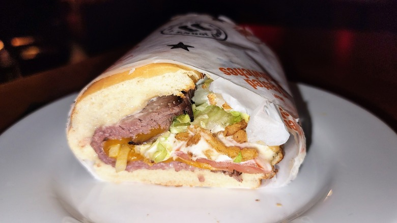 Jimmy John's Roast Beef & Cheddar sandwich on white plate