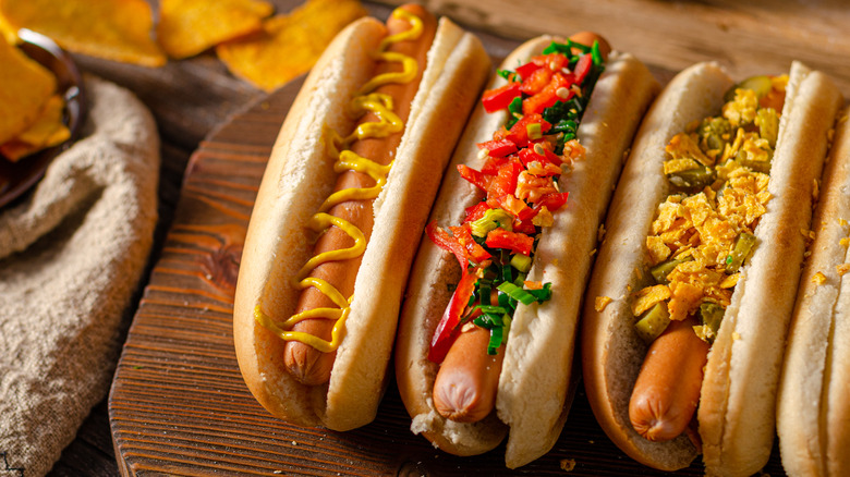 hot dogs with assorted toppings
