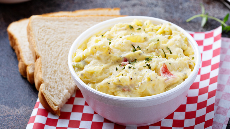 Creamy potato salad served with bread