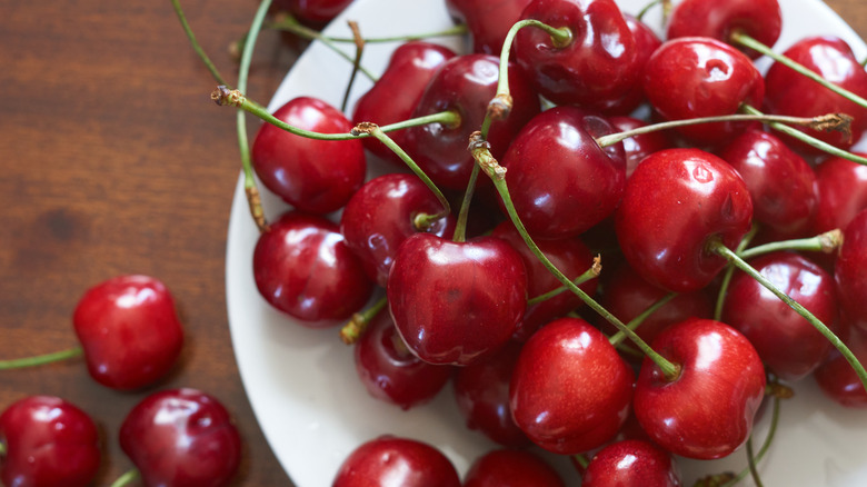 Red cherries on a plate
