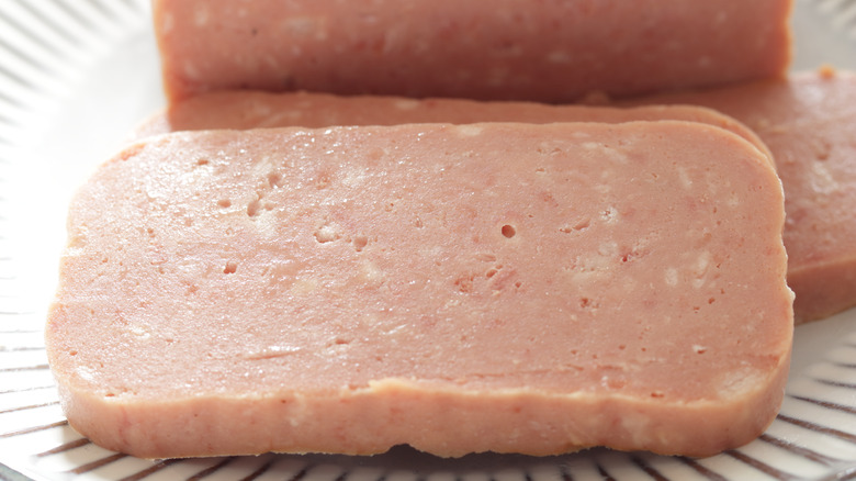 Slices of Spam on plate