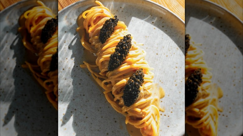 Pasta topped with caviar