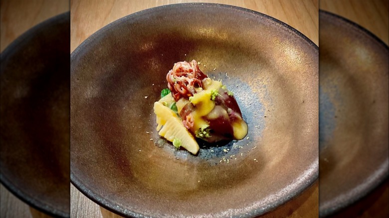 Sashimi on a bronze plate