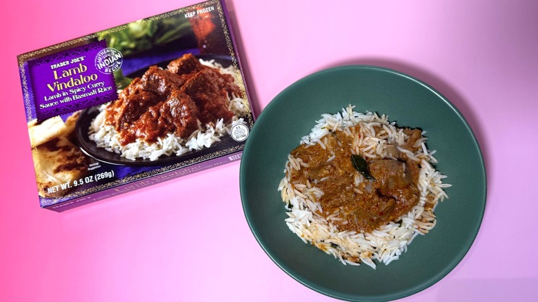 A bowl and box of Trader Joe's lamb vindaloo