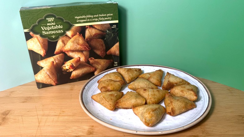 A box and plate of Trader Joe's mini vegetable samosas
