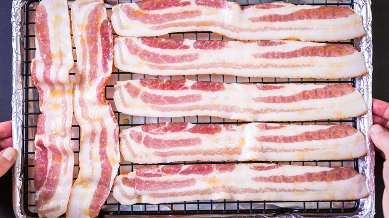 bacon strips on baking sheet