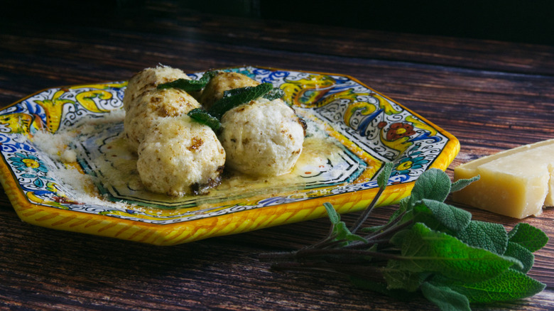 Rustic plateful of Gnudi with sage and butter
