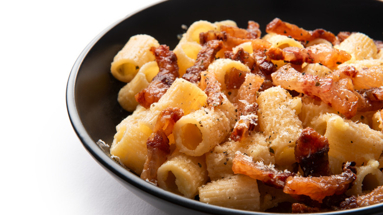 Close up of Pasta Alla Gricia in a black bowl