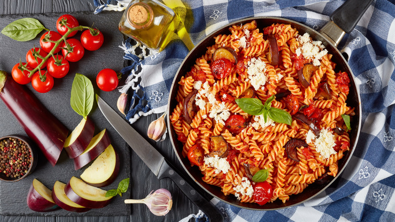 Bowl of pasta Alla Norma with eggplants and tomatoes