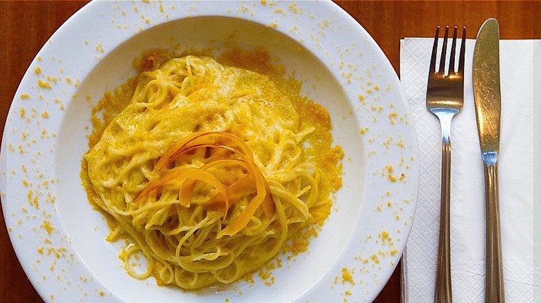 Spaghetti Alla Bottarga in white bowl