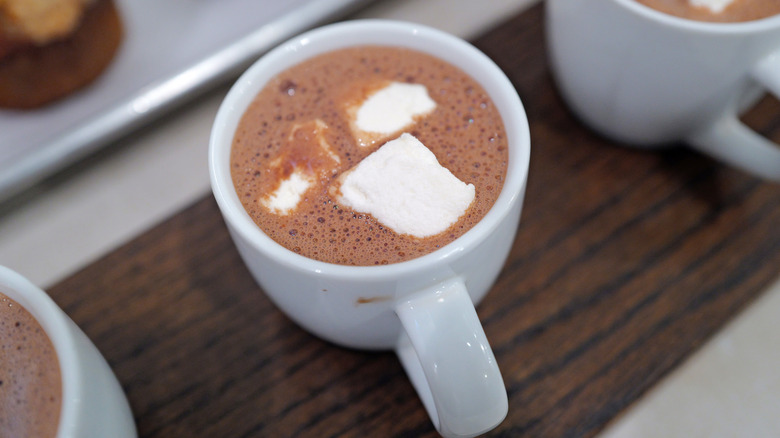 Cup of hot chocolate with white cheese