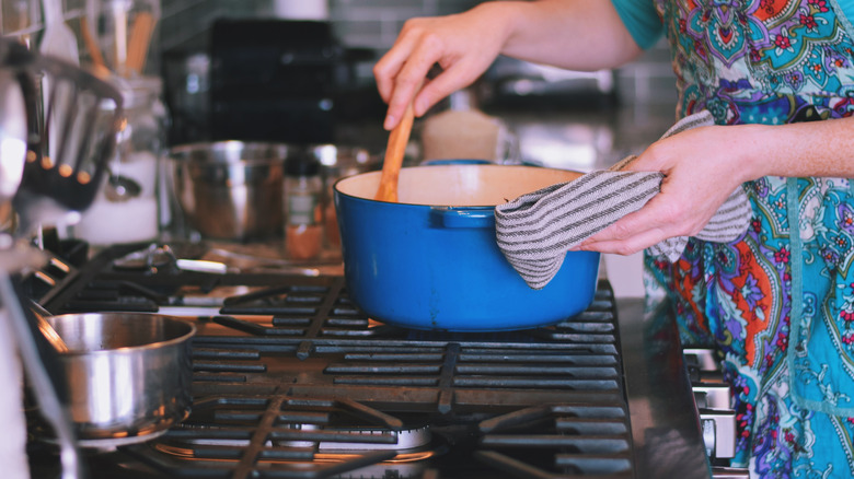 blue dutch oven on stove