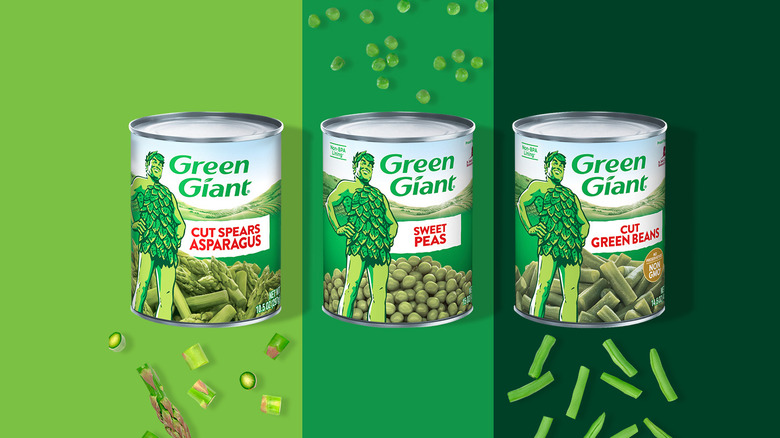 Green giant cans on green background