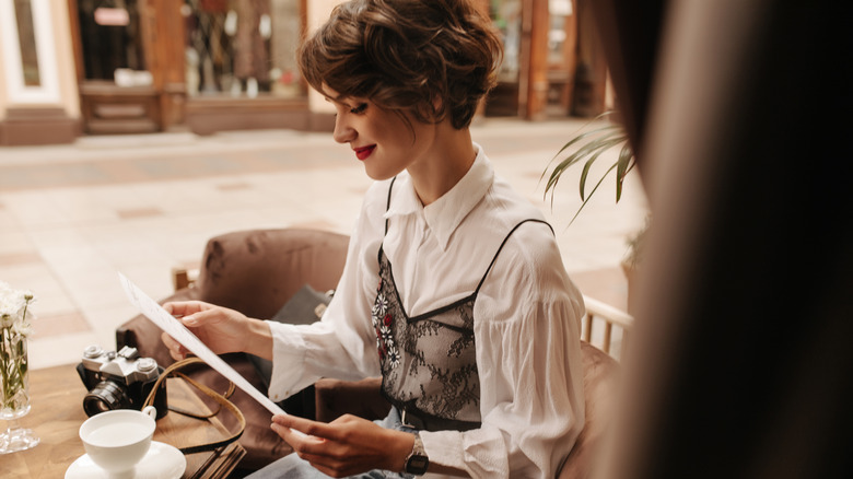Woman reading menu