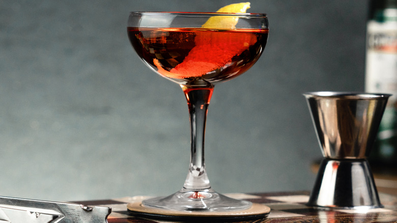 Whiskey-based cocktail in a coupe glass