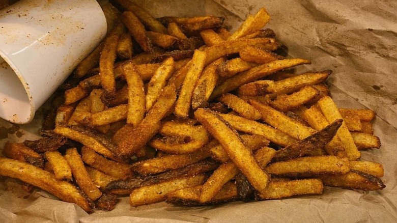 Pile of Five Guys fries on butcher paper