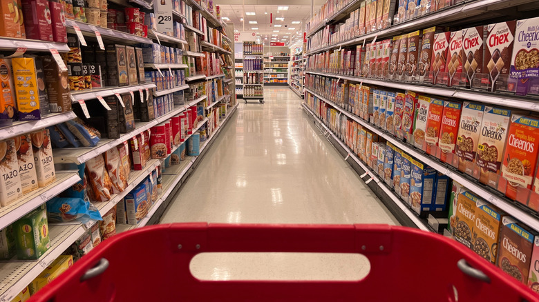 Target shopping cart in grocery aisle