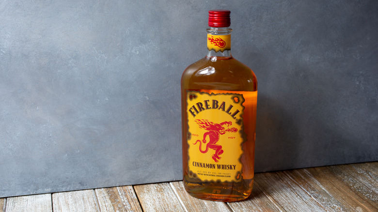 Bottle Fireball grey wall