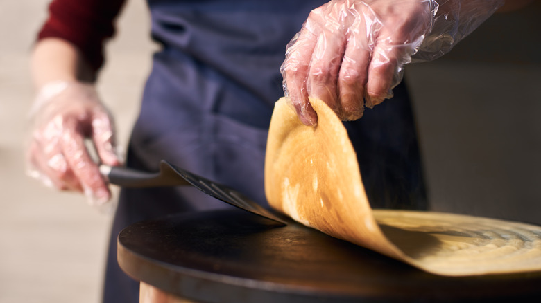 Chef cooking crêpe