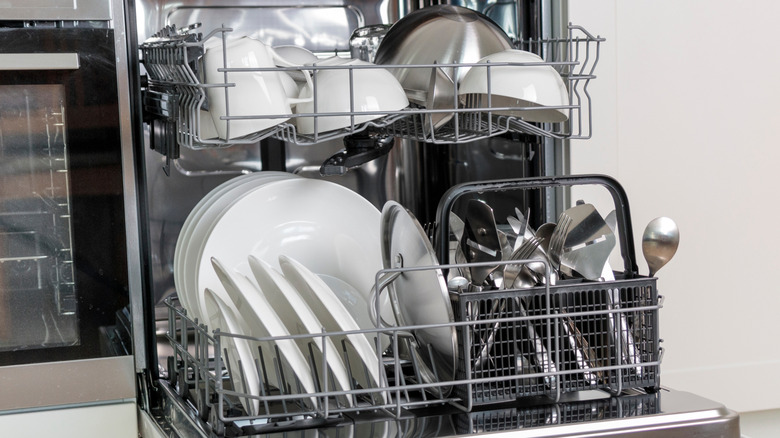 Well-organized dishwasher with clean dishes