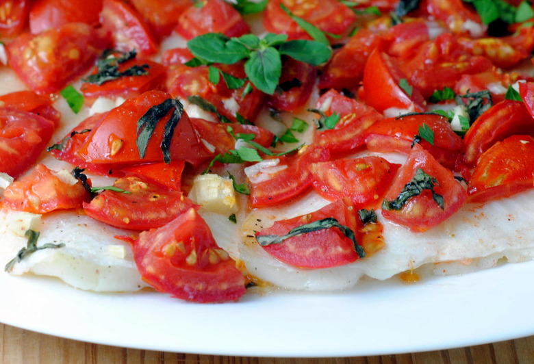Healthy baked sole with tomatoes and basil