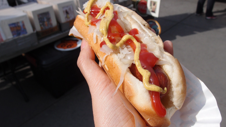 A hot dog with ketchup and mustard