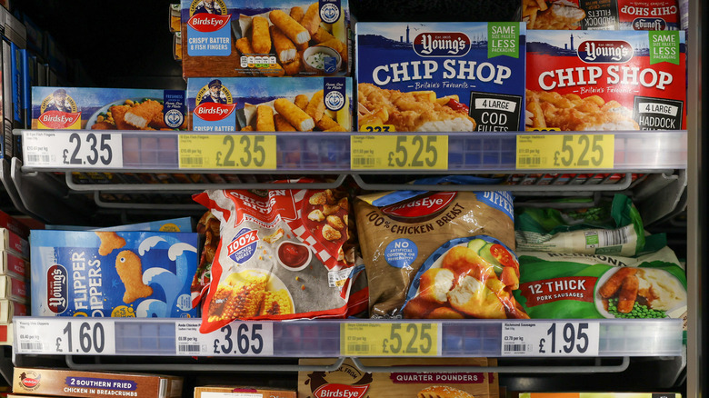 Grocery freezer with frozen food