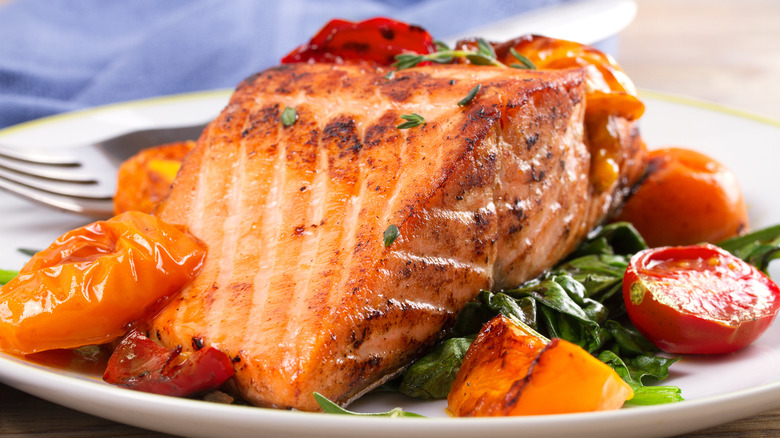 Seared salmon with tomatoes