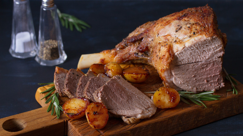Leg of lamb on cutting board