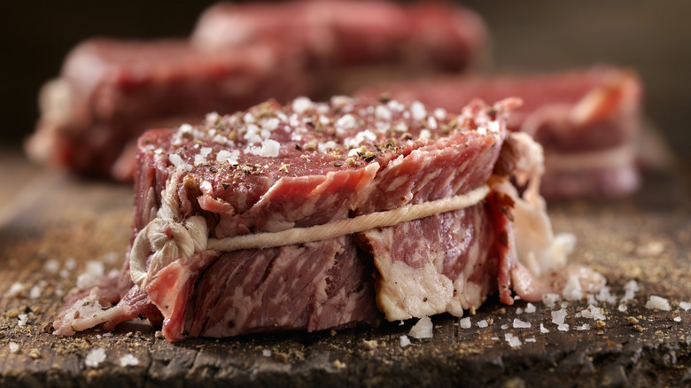 raw steak with salt