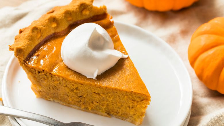 Pumpkin pie with whipped cream