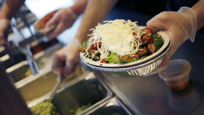 Chipotle burrito bowl in preparation