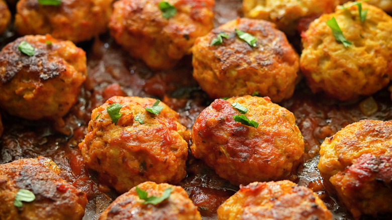 meatballs cooking in a pan