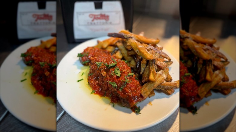 New York Strip with pizzaiola sauce and eggplant fries