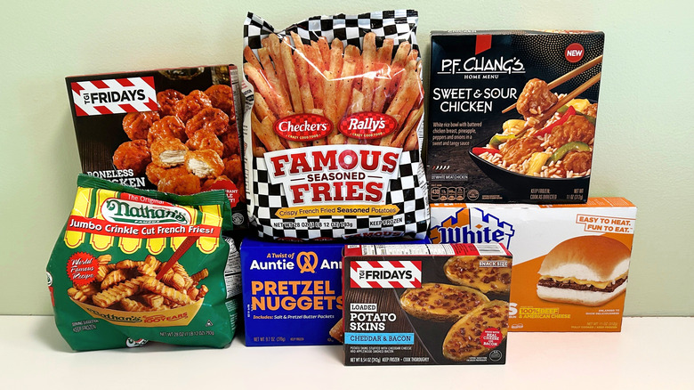 Several frozen foods from your favorite chains together on a green and white background