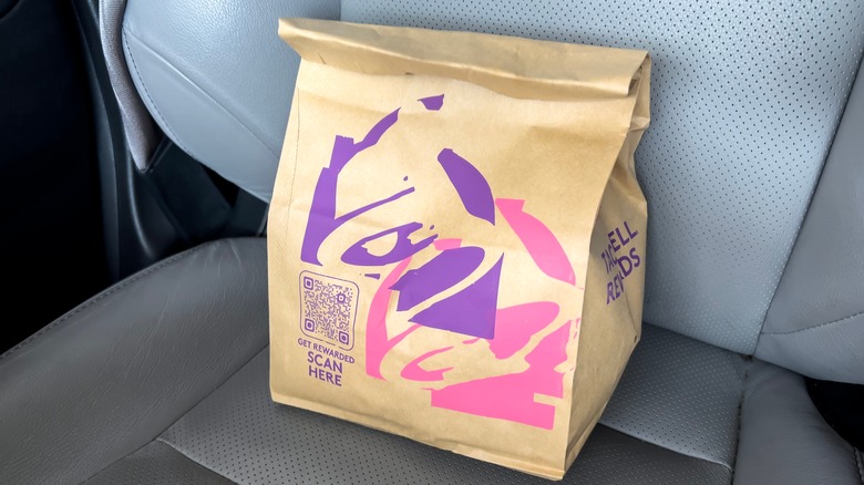 Taco Bell bag in car