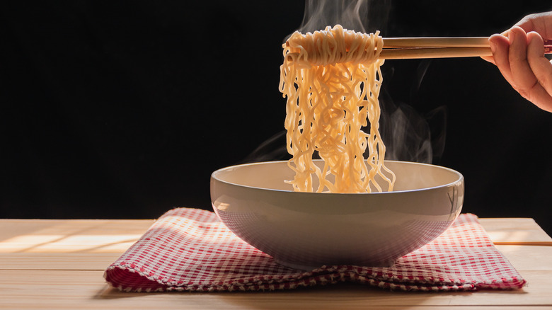 Chopsticks full of ramen 