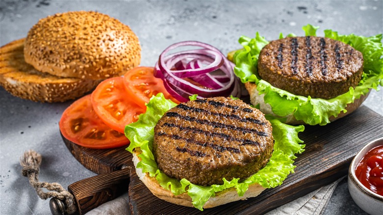 Burger patties on buns