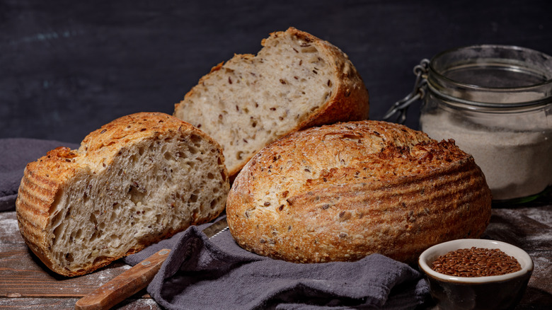 Whole and sliced sourdough loaves