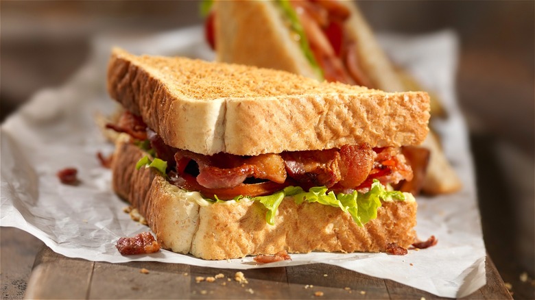 BLT sandwich on parchment paper 