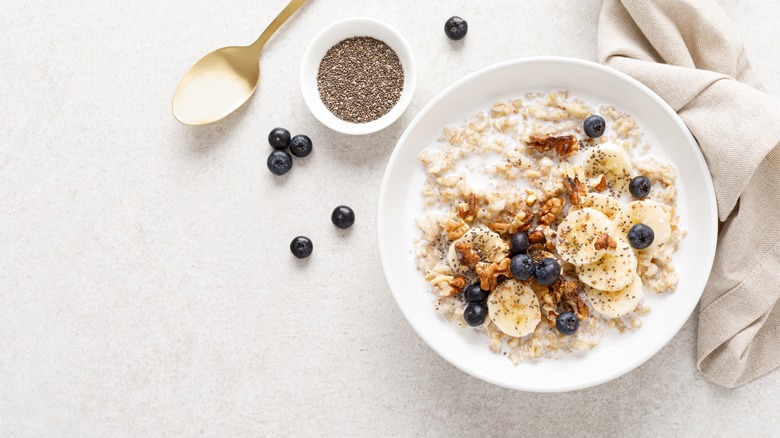 Bowl of oatmeal with fruits and nuts