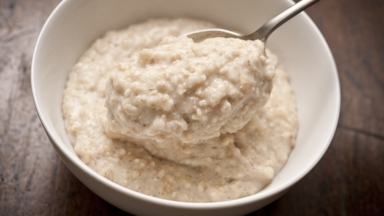 bowl of oatmeal with spoon