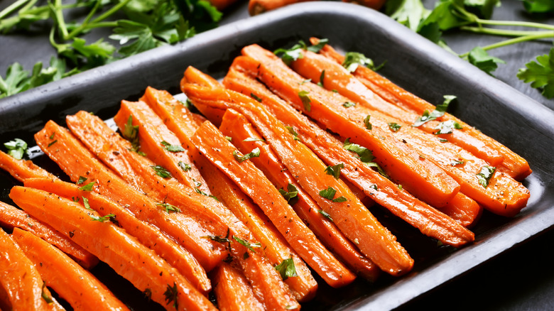 Glazed carrots on baking sheet