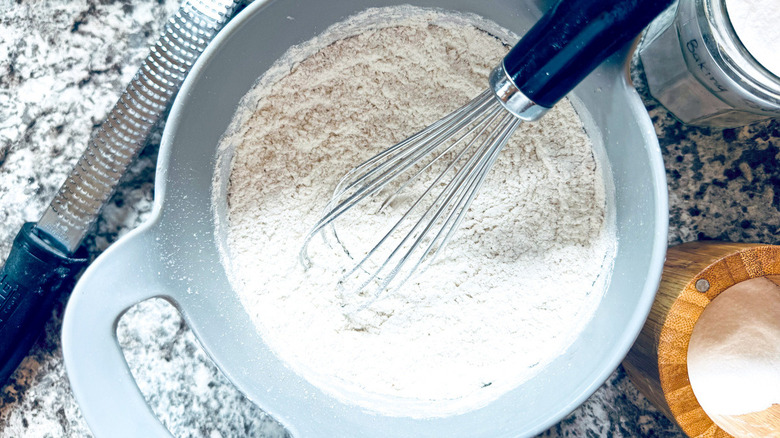 flour in bowl with whisk
